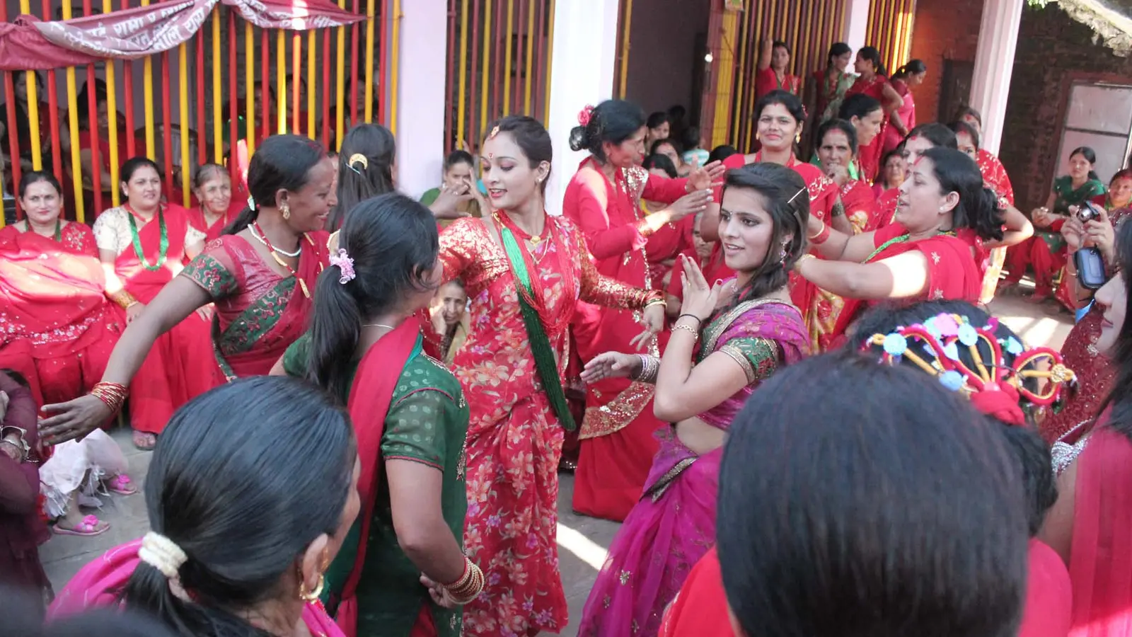 Three women celebrating Teej in Lalitpur, Nepal
